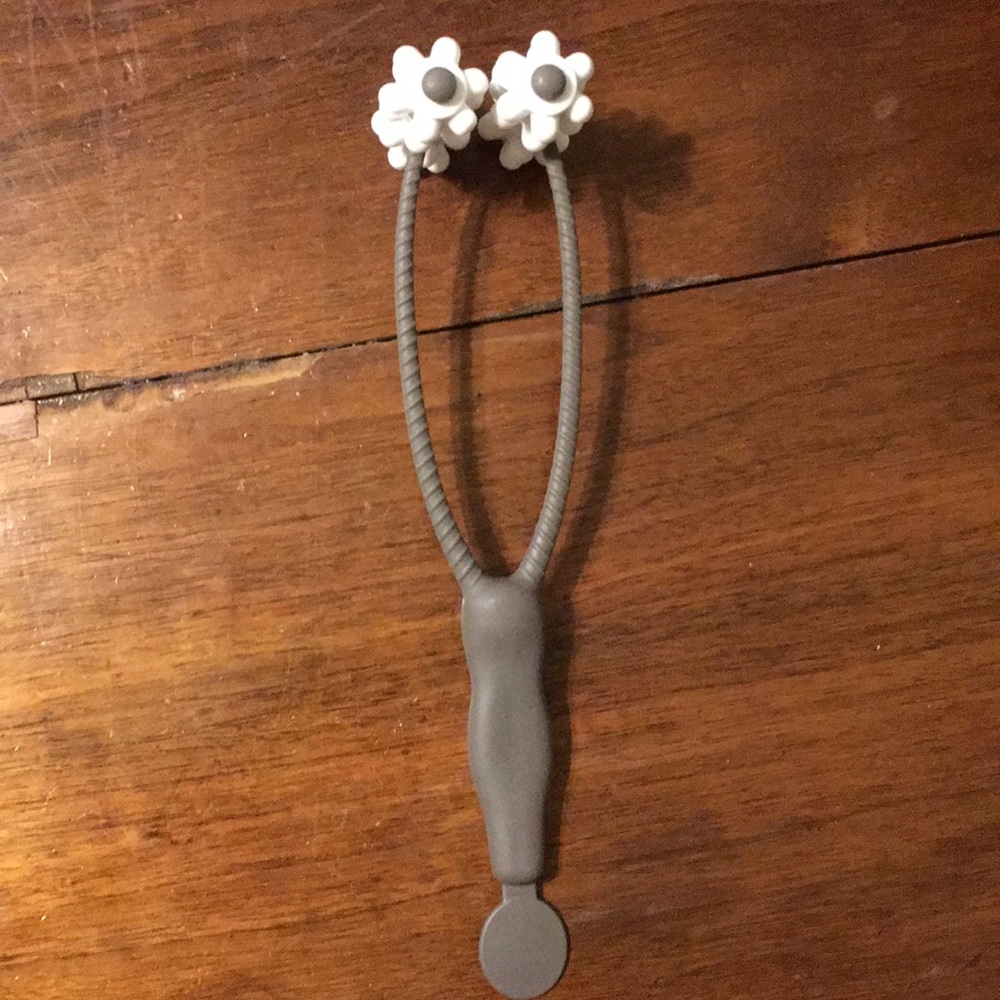 Handheld Gray Facial Roller with White Massage Wheels